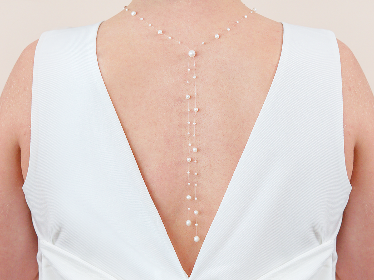 Floating pearl back necklace for brides
