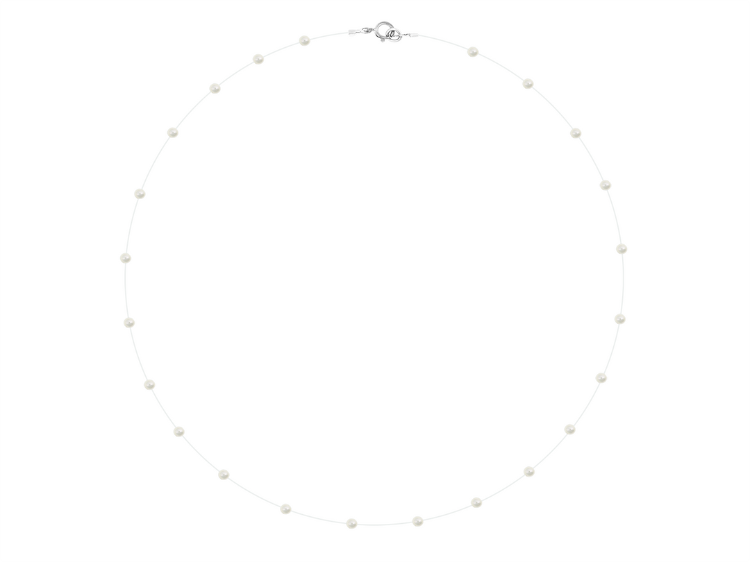 Leonore - Tiny Pearl Necklace on Clear Thread